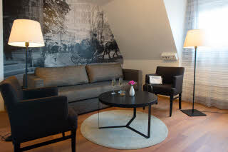 Sofa and chairs in Standard Family Four room at Scandic Sundsvall City
